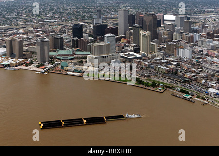 aerial view above tugboat pushing barge Mississippi river New Orleans Louisiana Stock Photo