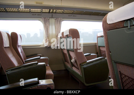 Japan. Interior of normal class carriage on the shinkansen, Bullet train, view from seat over to seats and window across aisle. Stock Photo