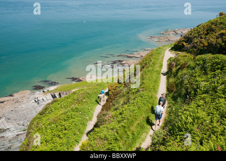 Walkers on the South West Coast Path near Combe Martin in Devon UK Stock Photo