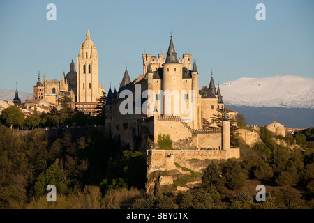 Segovia castle and Cathedral surounded by snow capped mountains, Segovia, Spain Stock Photo