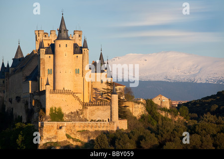 Segovia castle and Cathedral surounded by snow capped mountains, Segovia, Spain Stock Photo