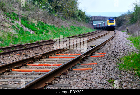 First Great Western HST train on curve in rural Cotswold s UK Stock Photo