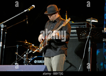 The bass guitarist of the Noon band performing on stage at the Hua Hin jazz festival 2009 Thailand S.E. Asia Stock Photo