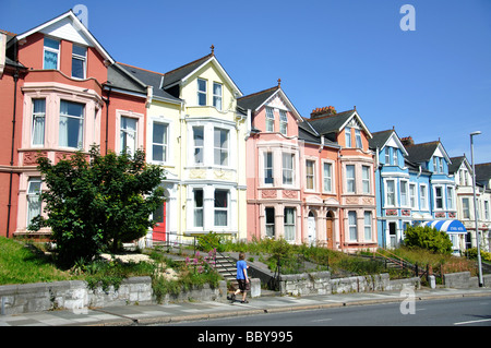 Pastel-coloured terraced houses, Wolseley Road, Plymouth, Devon, England, United Kingdom Stock Photo