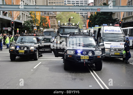 Police riot squad in formation, with water canon at centre. Stock Photo