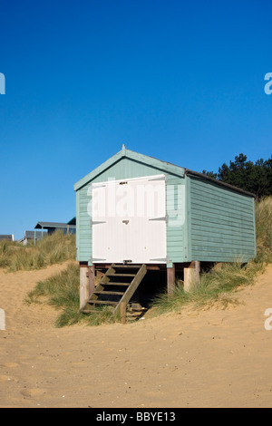 Beach huts on the sand dunes at Old Hunstanton on the North Norfolk Coast Stock Photo