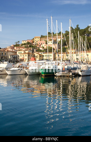 Yachts moored in the glamorous marina of Porto Azzurro on the Island of Elba Stock Photo