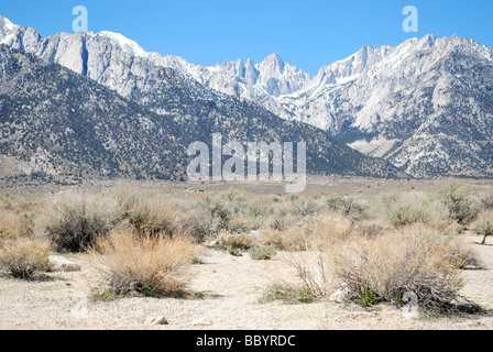 Mt Whitney the rocky peak in the center from the Mojave desert near the town of Lone Pine in the Owens Valley CA USA Stock Photo