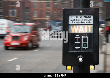 Traffic light and London cab Stock Photo