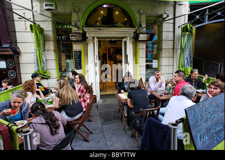 People dinning alfresco in trendy cafe Dublin Republic of Ireland Stock Photo