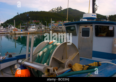 Close up view of a trawler, and a salmon fishing fleet in the background. Stock Photo