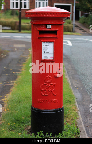 A Georgian red letter box in a typical suburban street Stock Photo