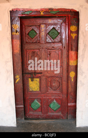 Traditionally Decorated House Door In A Typical Paroja Tribe Village In Orissa, India Stock Photo