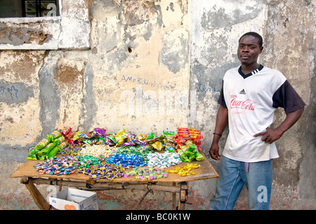 Street hawker selling sweets Quelimane Mozambique Stock Photo