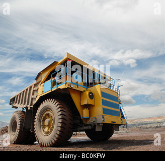 The big trucks transport iron ore in career Stock Photo