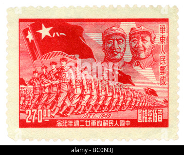 Old Chinese postage stamp with Mao and the Red Army marching Stock Photo