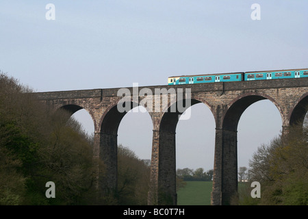 Commuter train crossing Porthkerry Viaduct Barry Vale of Glamorgan South Wales UK Stock Photo