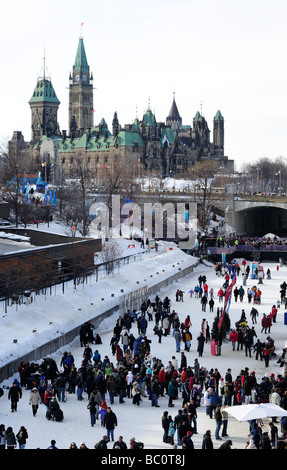 Canada, Ottawa, Rideau Canal, Winterlude, People Skating On The Longest Ice Skating Rink In The World, UNESCO World Heritage Site Stock Photo