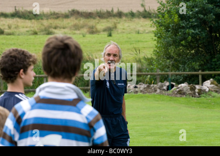 England rugby captain 1977 &1979 Roger Uttley coaches at Suffolk prep school Brandeston Hall Stock Photo