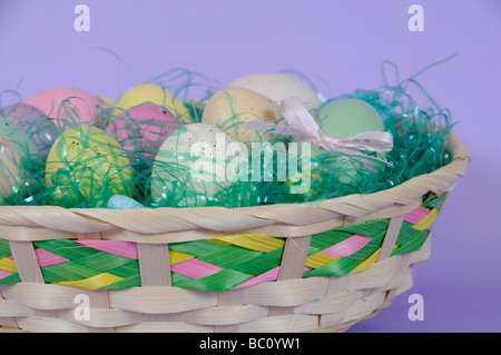 Easter Eggs on Grass in Basket Stock Photo
