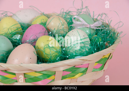 Easter Eggs on Grass in Basket Stock Photo