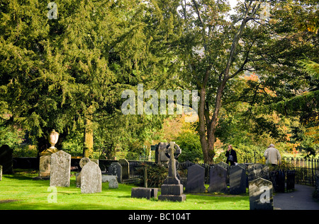 Visitors, graves of the Wordsworth family, St. Oswald's Parish Church, Grasmere, England Lake District.  Editorial Use Only. Stock Photo