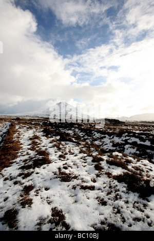 Snow covered Errigal mountain and peat bog at Dunlewey, Co. Donegal Ireland. Stock Photo