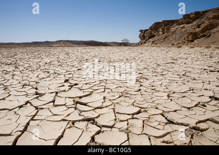 Arid desert floor in dry wadi bed in  the Red Sea Hills, Eastern Desert, Egypt Stock Photo