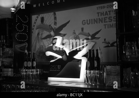 The Guinness Time clock with the wheel, the city hall, in a pub, Belfast, Northern Ireland, United Kingdom, UK, GB Stock Photo