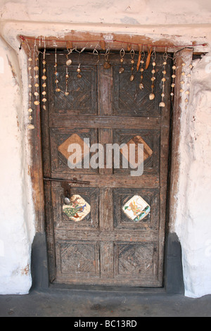 Traditionally Decorated House Door In A Typical Paroja Tribe Village In Orissa, India Stock Photo