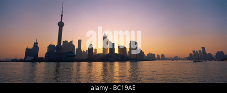 China, Shanghai, The Huangpu River and many of the new towers of Pudong, including the Oriental Pearl TV Tower. Stock Photo