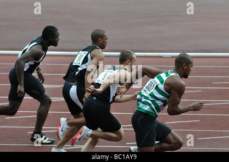 Men sprinting in race Stock Photo