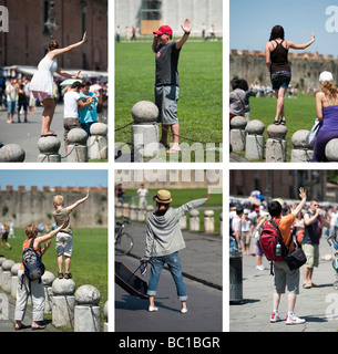 Leaning Tower in Pisa, Italy, for further information what these people are doing, please have a look to the description field Stock Photo