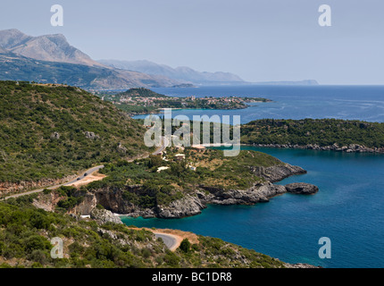 Looking down the coast of the Outer Mani with Stoupa and its acropolis in the middle distance Outer Mani Peloponnese Greece Stock Photo