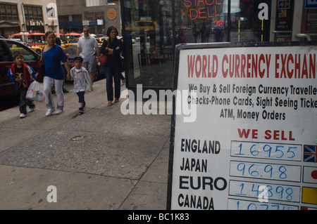 Currency exchange sign in midtown in New York on Sunday June 20 2009 Frances M Roberts Stock Photo