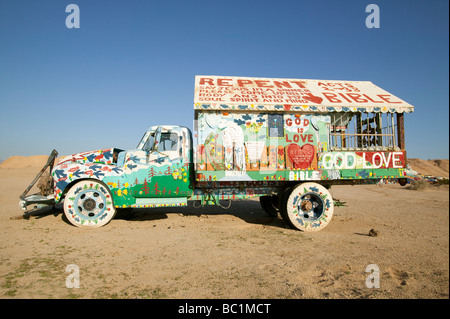 Old truck with colorful painting/graphics including religious references. At Salvation Mountain, near Niland, CA Stock Photo