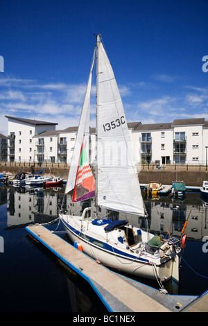 A yacht moored in Ardrossan harbour, North Ayrshire, Scotland. Stock Photo