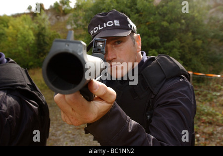 Humberside police officer demonstrates the the Heckler Koch L104 A1 Baton Gun uk Stock Photo