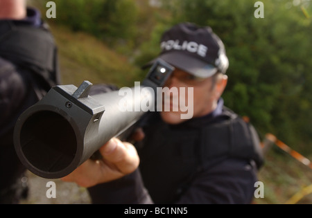 Humberside police officer demonstrates the the Heckler Koch L104 A1 Baton Gun uk Stock Photo