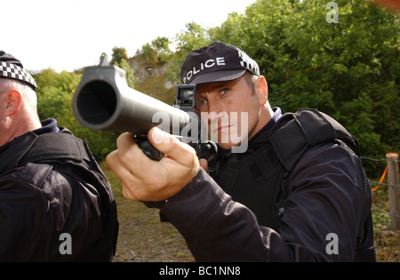 Humberside police officer demonstrates the the Heckler Koch L104 A1 Baton Gun uk Stock Photo