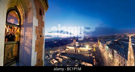 Every hour trumpeter plays anthem from St Mary s Church Tower Krakow Poland Stock Photo