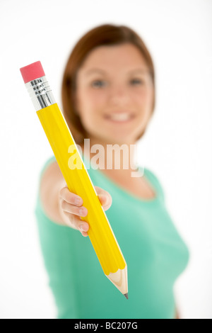 Woman Holding Big Pencil Stock Photo