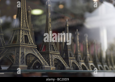 Models Of Eiffel Tower In Shop Window Stock Photo