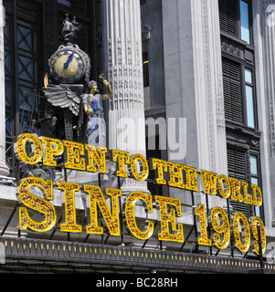 Selfridges department store a Grade II listed retail building on Oxford Street  electronic signs above entrance 100 trading clock sculpture London UK Stock Photo