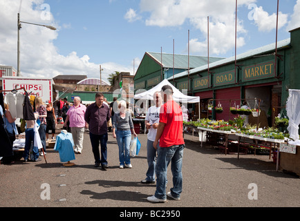 Shoppers and visitors among the stalls in The Barras, the traditional flea market in the east end of Glasgow. Stock Photo