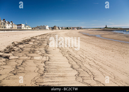 Coal dust on the beach at Newbiggin-by-the-Sea Northumberland. Stock Photo