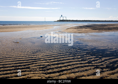 Coal dust on the beach at Newbiggin-by-the-Sea, Northumberland. Stock Photo