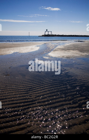 Coal dust on the beach at Newbiggin-by-the-Sea, Northumberland. Stock Photo