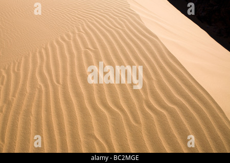 Close up of desert sand dune showing ripples and texture Stock Photo