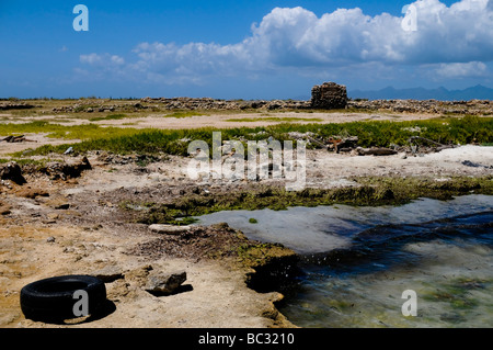 Polluted historical ruins sit among trash in Cubagua Island, Venezuela. Stock Photo